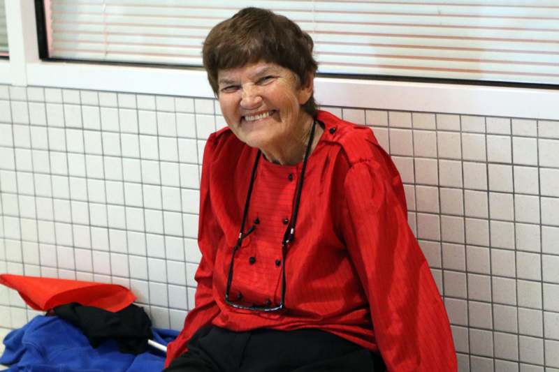 a woman smiling at camera
