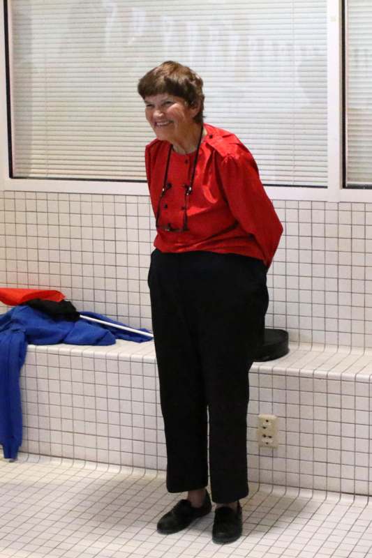 a woman in a red shirt