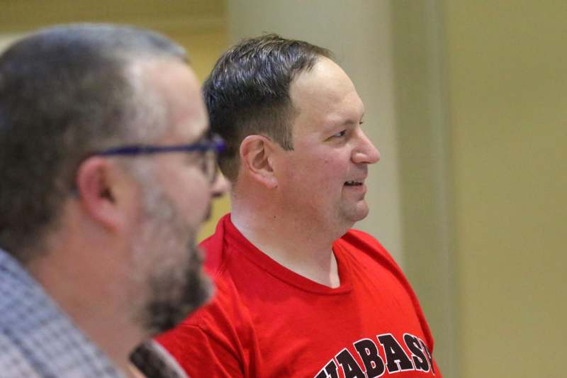 a man in a red shirt