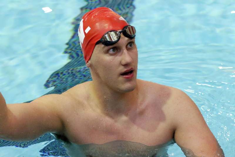 a man in a swimming pool