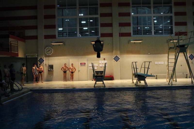 a group of people in a swimming pool