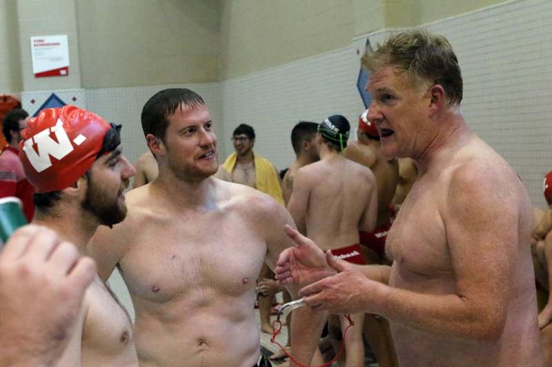 a group of men in swim suits
