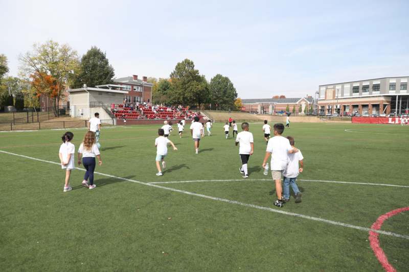 a group of kids on a field