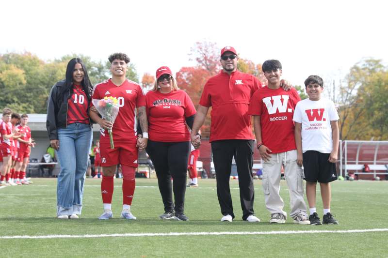 a group of people standing on a field