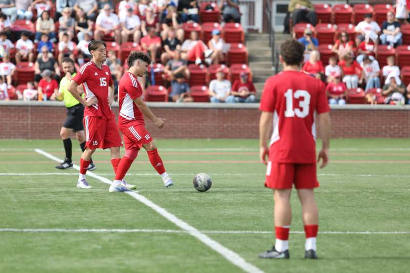 a group of men playing football