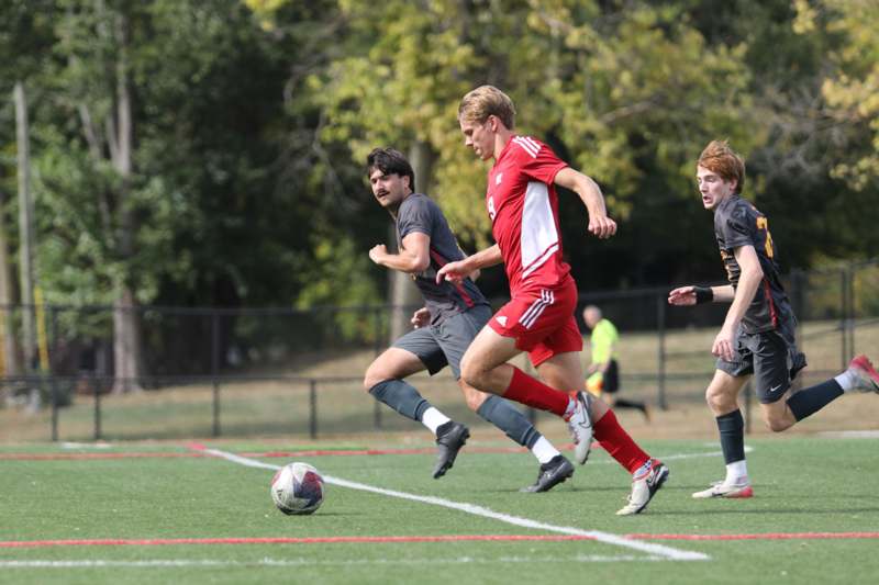 a group of men playing football