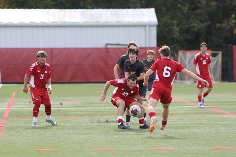 a group of people playing football