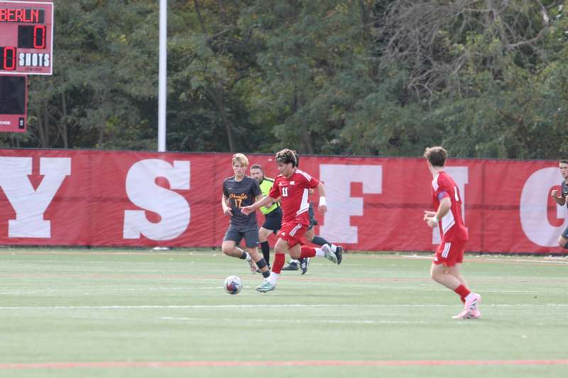 a group of men playing football