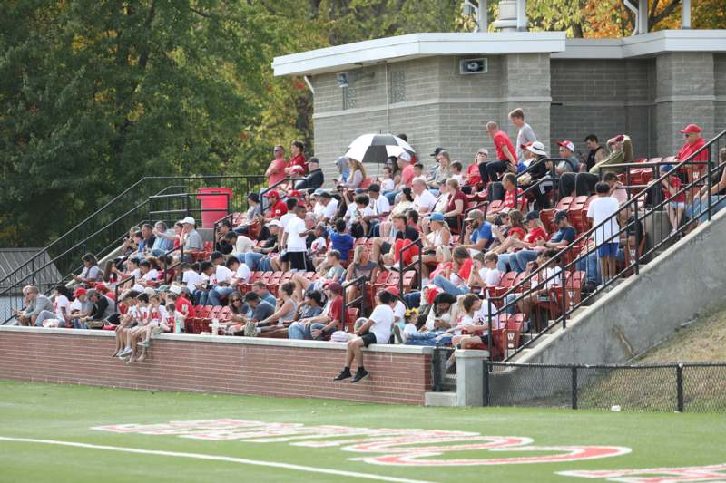 a crowd of people in bleachers