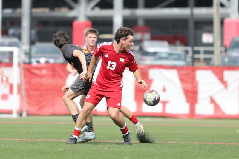 a group of men playing football
