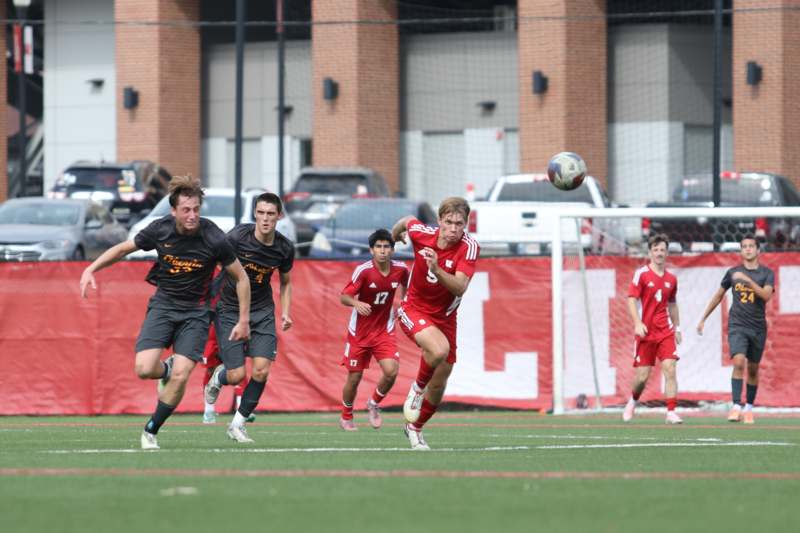 a group of men playing football