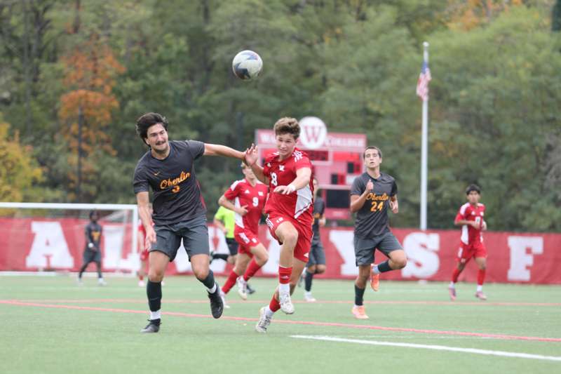 a group of men playing football