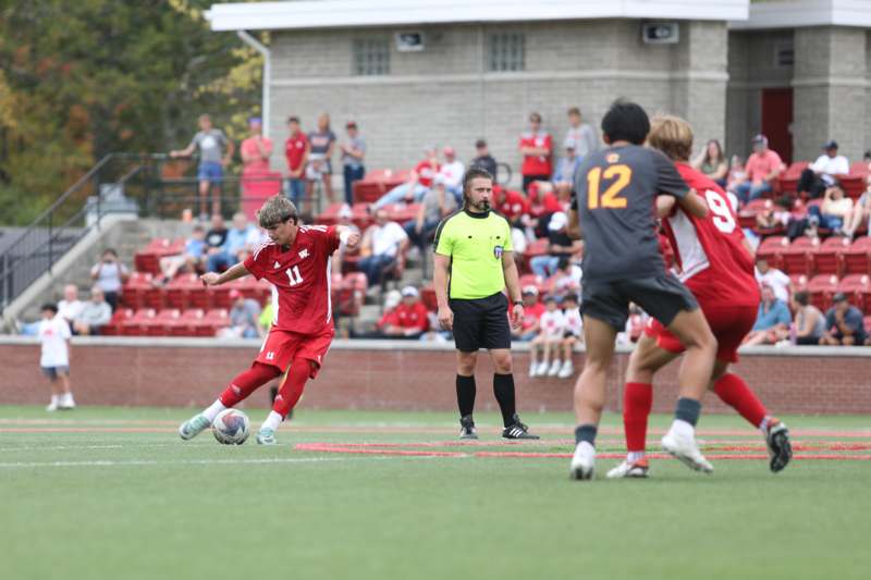 a group of people playing football