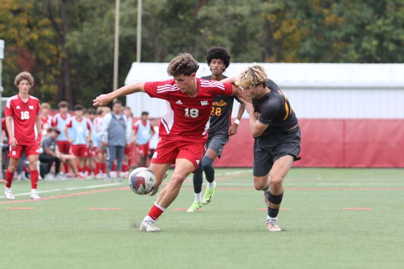 a group of men playing football