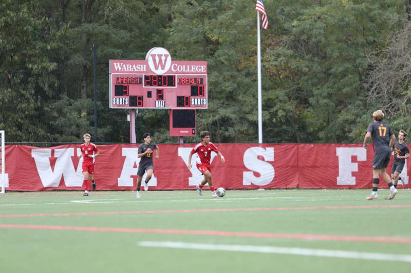 a group of men playing football