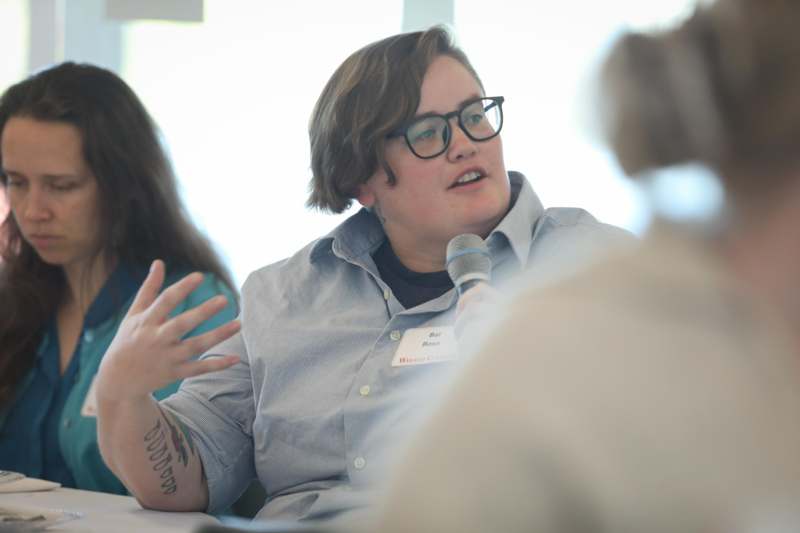 a person talking into a microphone