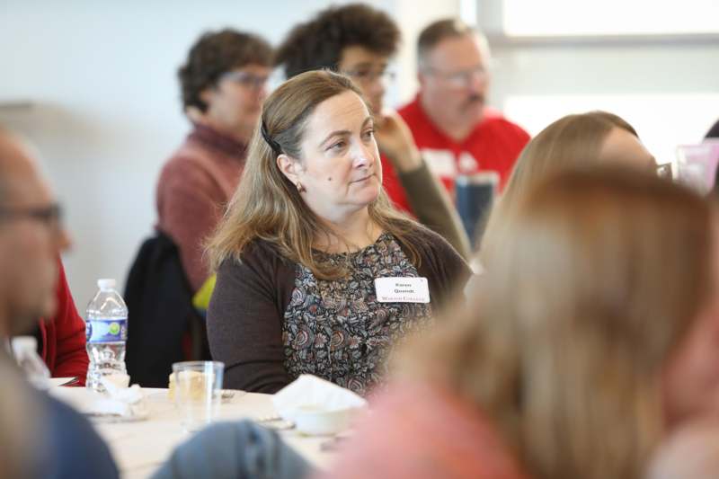 a woman sitting at a table