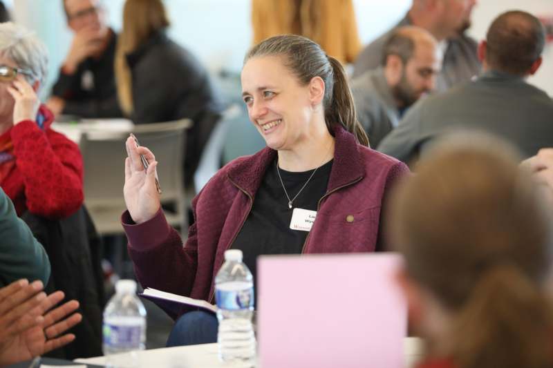 a woman smiling at camera
