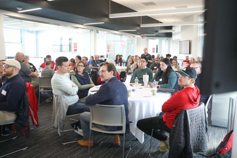 a group of people sitting at tables