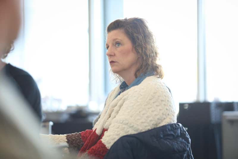 a woman sitting in a chair