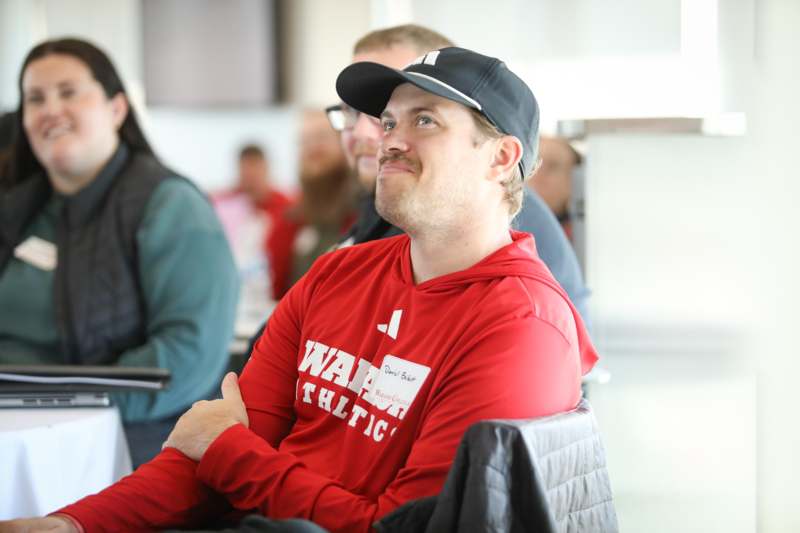 a man in a black hat
