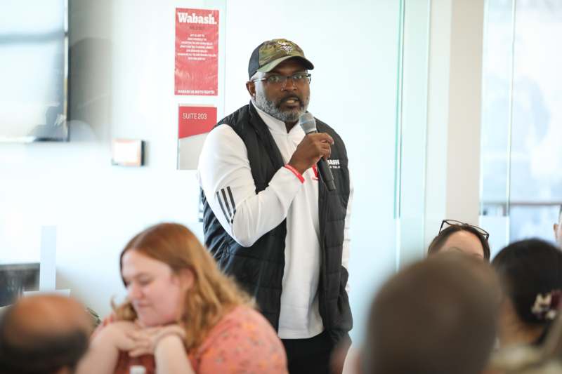 a man holding a microphone