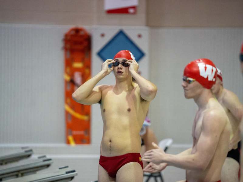 a man in swimsuits and goggles