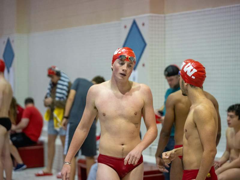 a group of men in swim suits