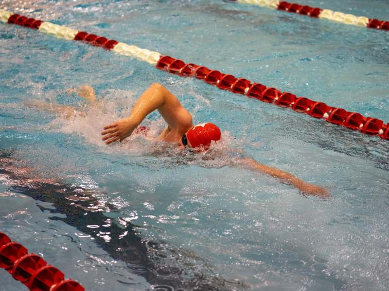 a person swimming in a pool