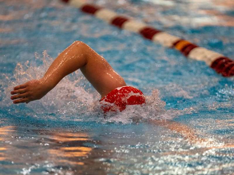 a person swimming in a pool