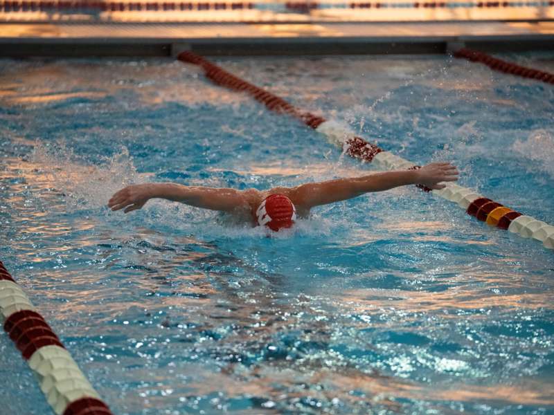 a person swimming in a pool