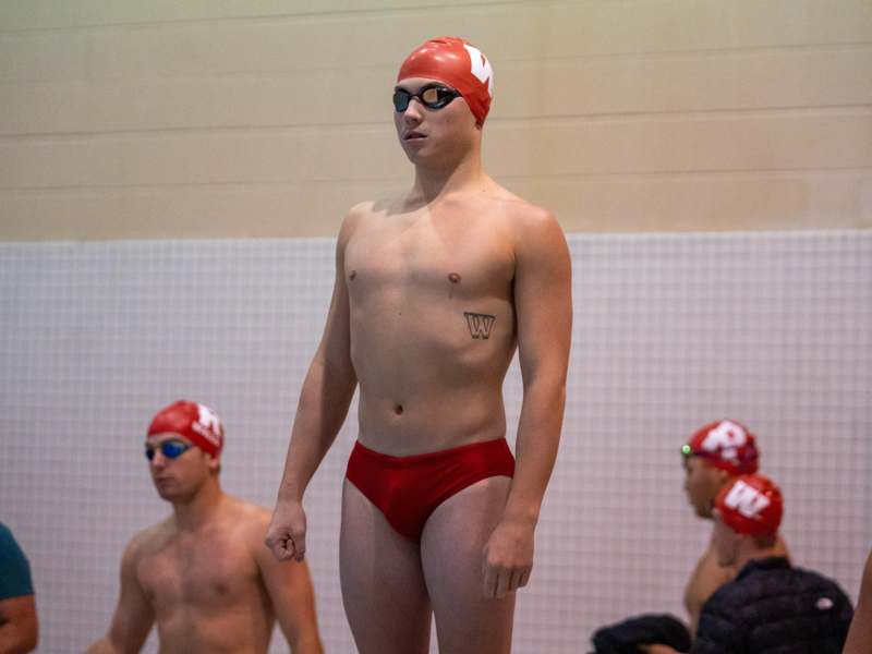 a group of men in swim suits