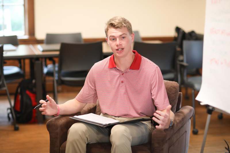 a man sitting in a chair