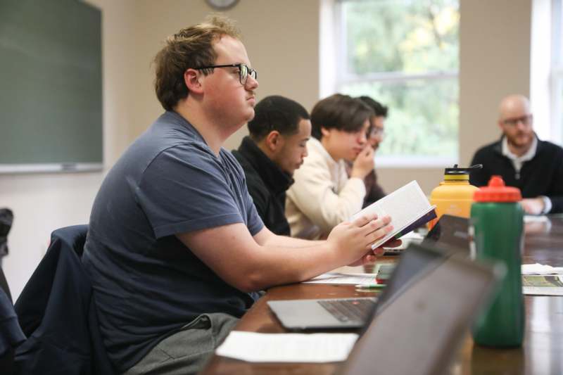 a group of people sitting at a table