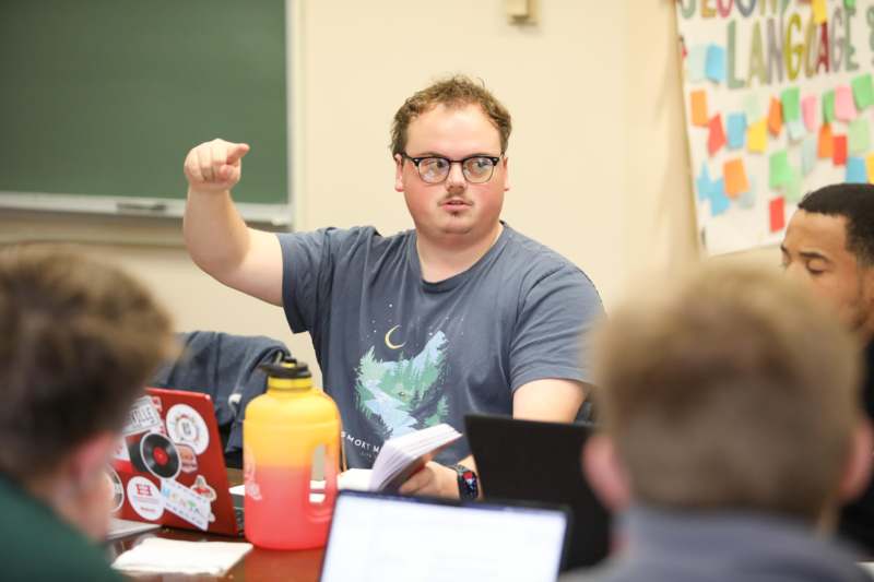 a man pointing at something