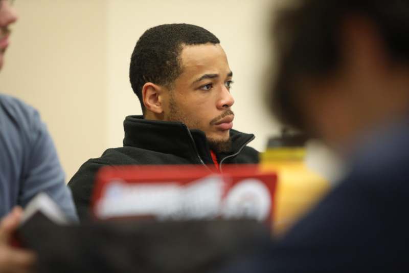 a man sitting in a room