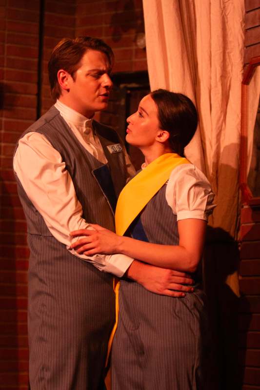 a man and woman in uniform