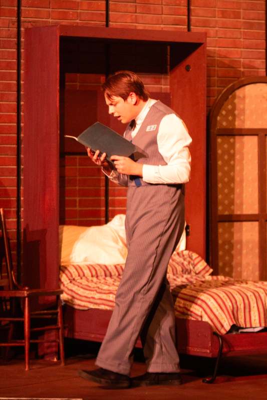 a man holding a book