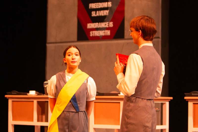 a man and woman in a dress