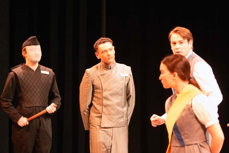 a group of people on a stage