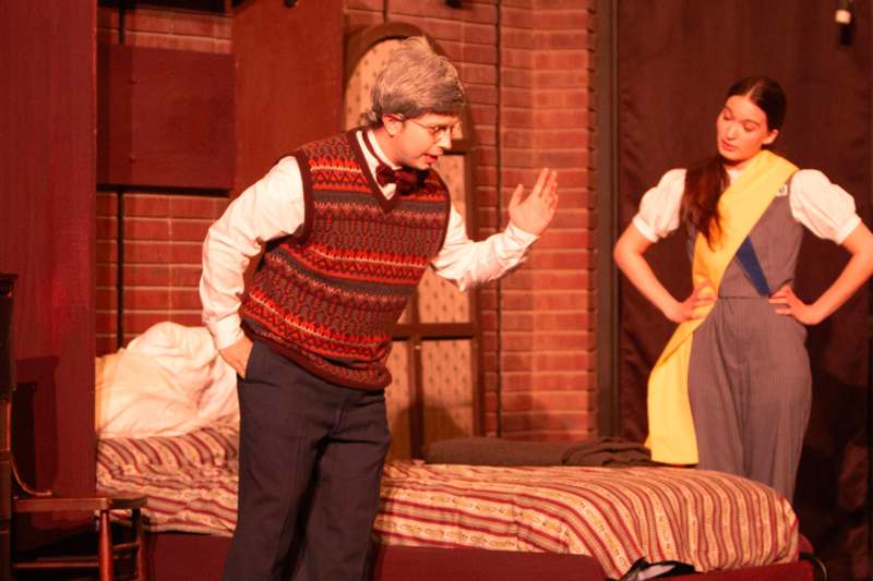 a man and woman in a scene from a play