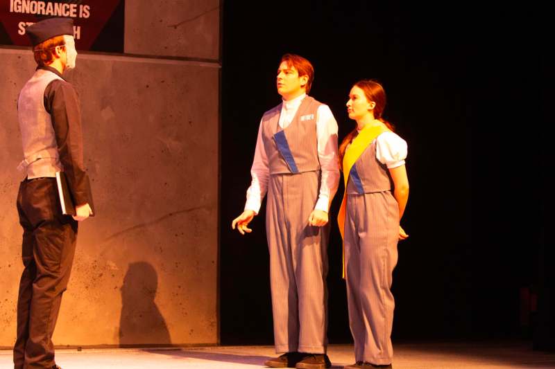 a man and woman on a stage