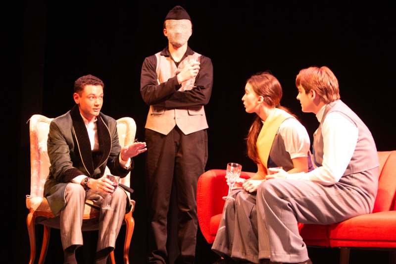 a group of people sitting in chairs