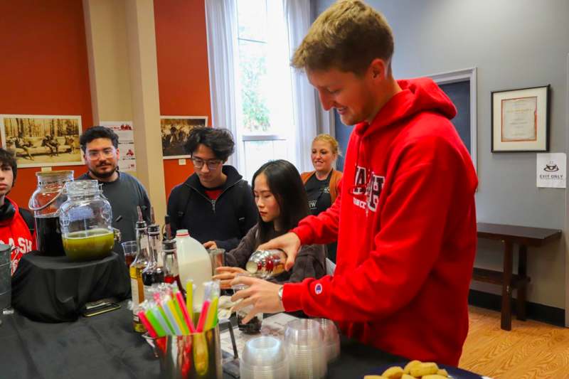 a group of people around a table