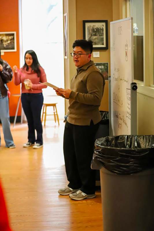 a man holding a piece of paper