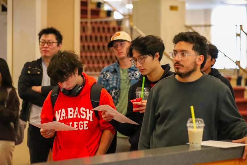 a group of people standing in a line