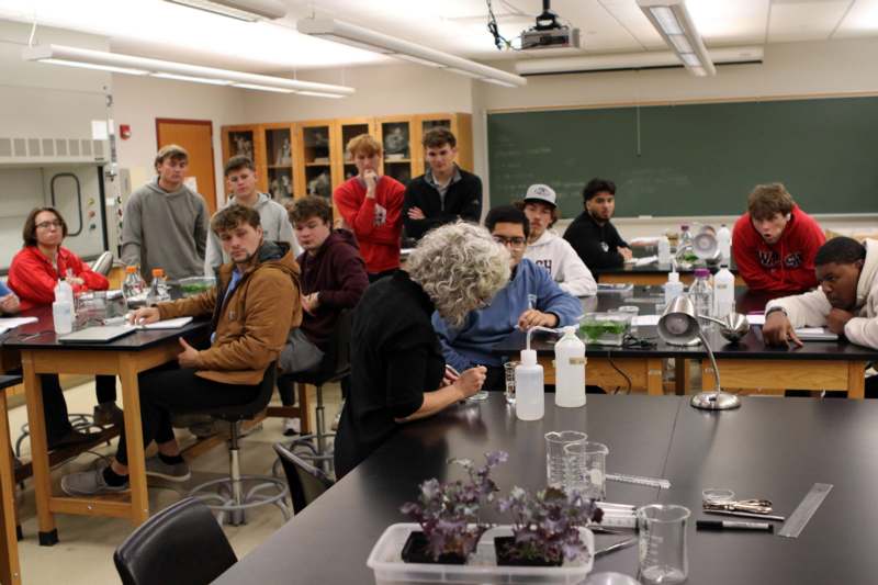 a group of people in a classroom