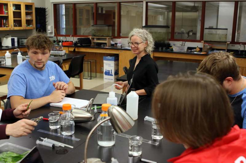a group of people sitting at a table