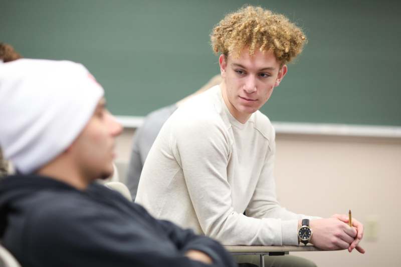 a man sitting at a desk