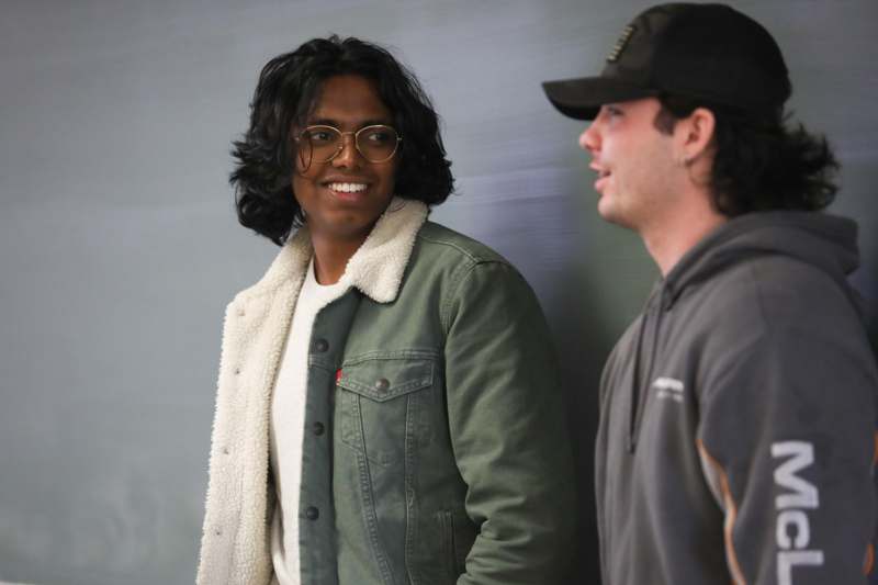 a man and woman smiling